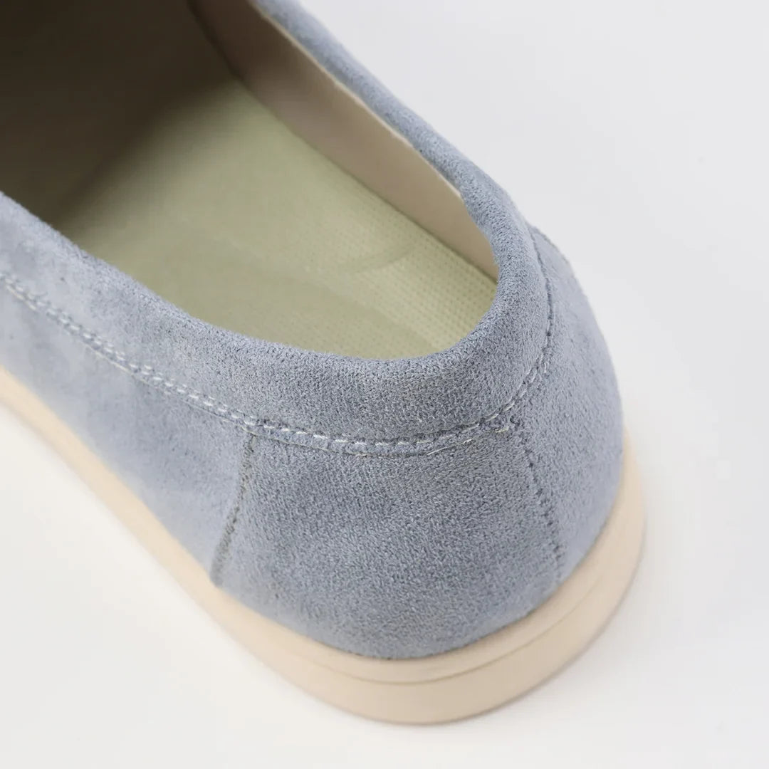 Women's suede loafers with moccasin toe stitching